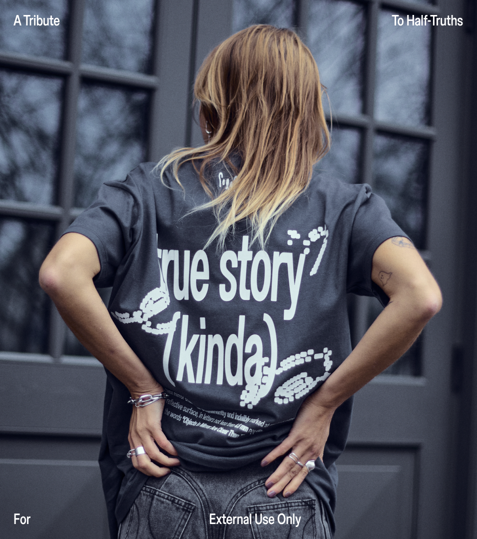 Graphic of a typography specimen showing the alphabet and numerals on top of a dark gray background.